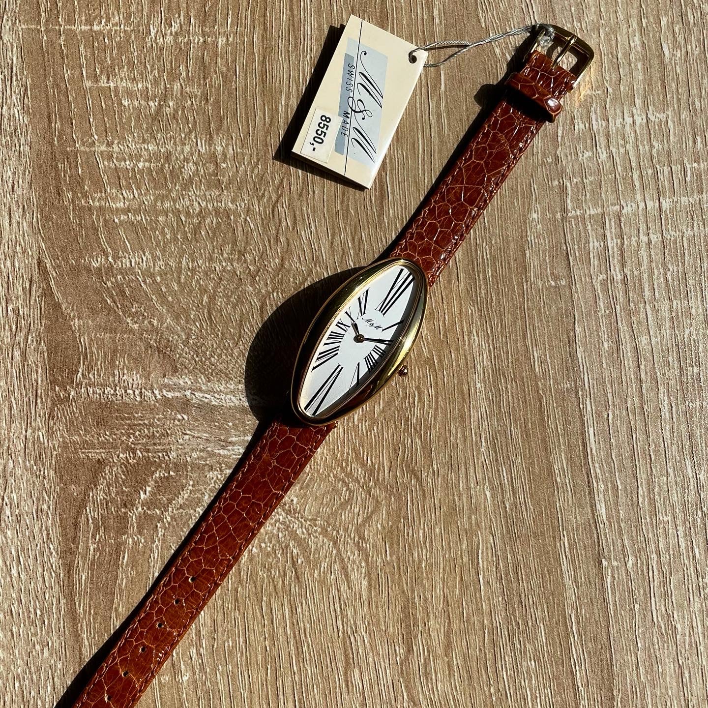 NOS M&M Swiss Made Curved Oval Watch in the Style of Cartier London Baignoire Allongée / New York Maxi Oval